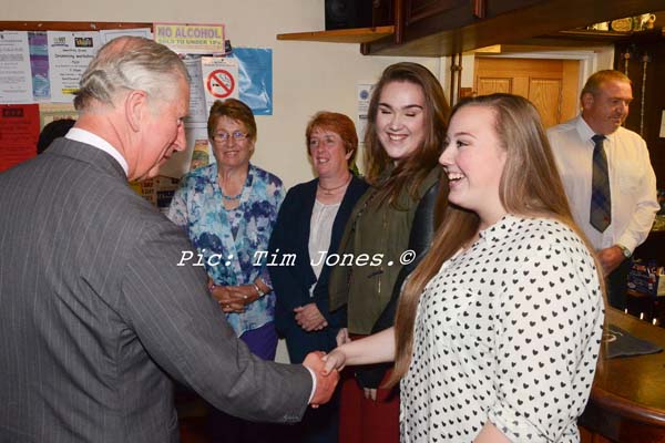 HRH The Prince of Wales meeting family and friends of the landlady at The New Inn
