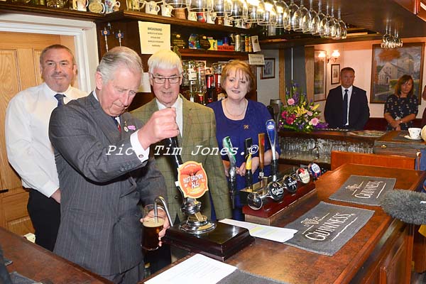 HRH The Prince of Wales behind the bar at The New Inn, Llanddewi Brefi