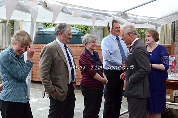 HRH The Prince of Wales meeting family and friends of the landlady in the marquee at The New Inn